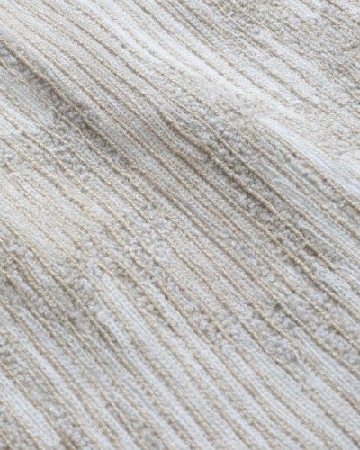 A fabric woven using special textured yarns to
create dimension. The skill is in knowing
where to use what yarn.